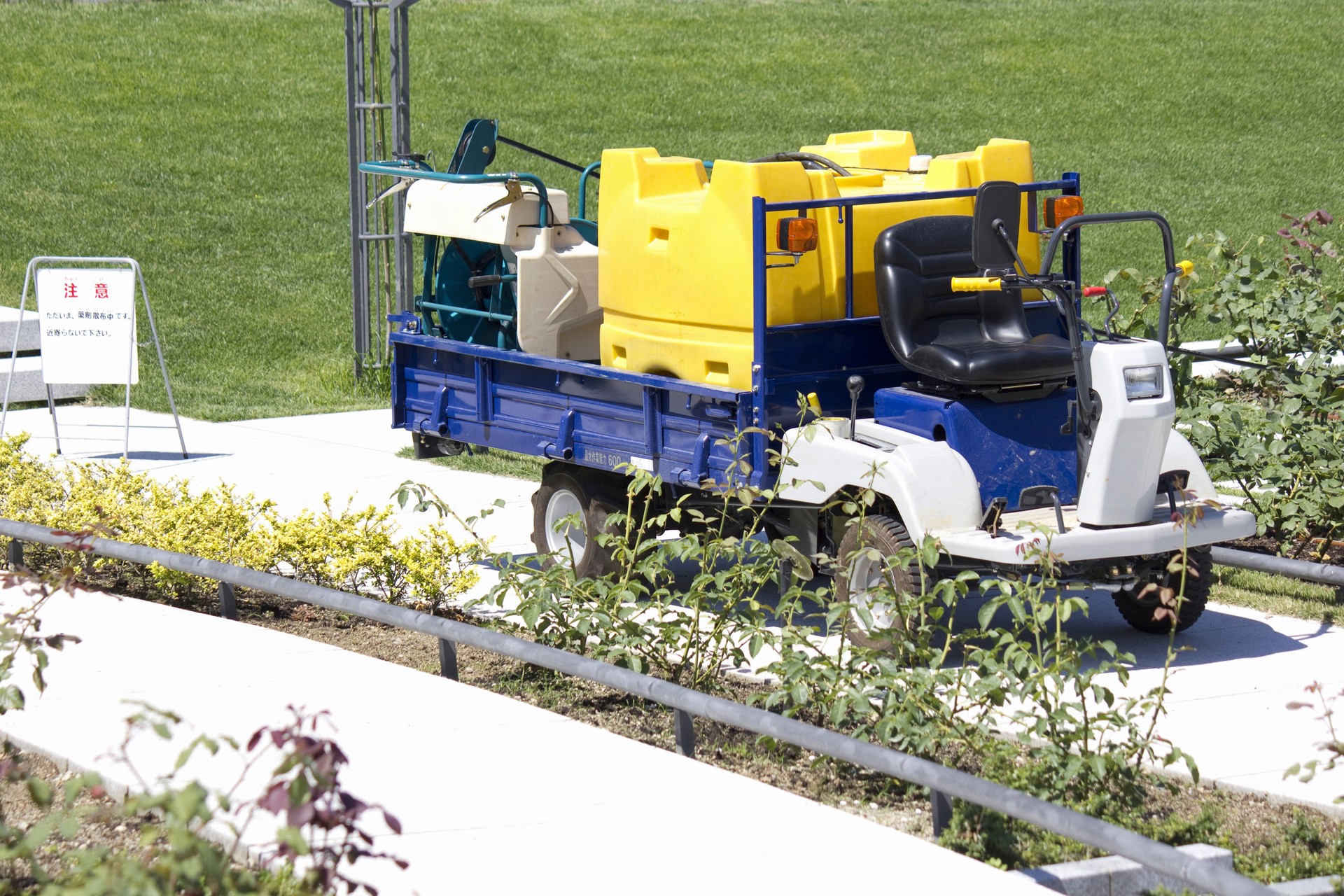 Vehicle for spraying pest control chemicals on rose leaves